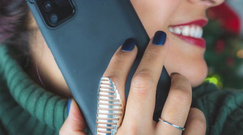 Customer on the phone smiling